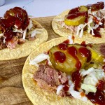 tacos made from leftover pulled pork with pickles and bbq sauce