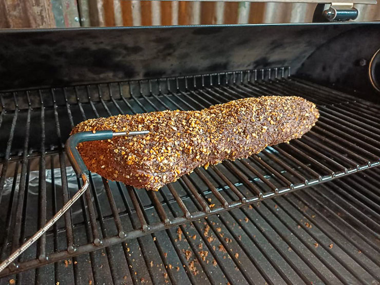 beet tri-tip cooking on a pellet grill