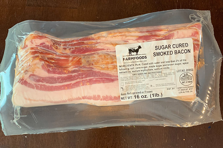 sliced and vacuum sealed pork bacon