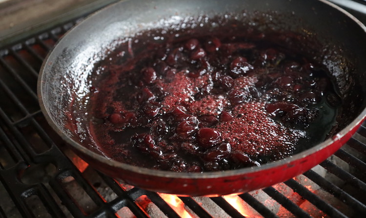 Cherry orange sauce in a frying pan