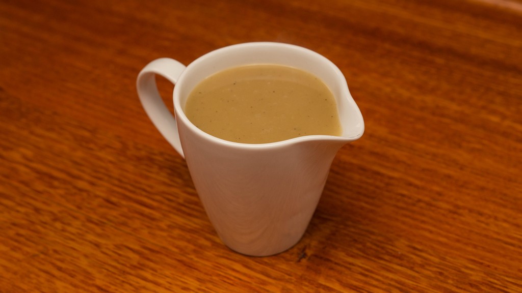 Homemade gravy in a pouring jug
