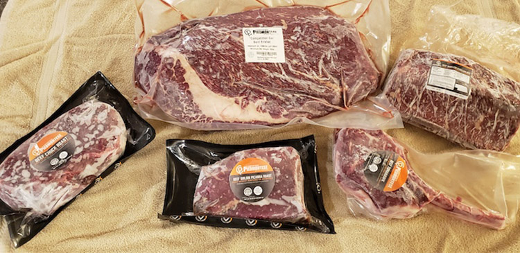 packaged raw tomahawk, chuck roast, sirloin roast, picanha and beef brisket