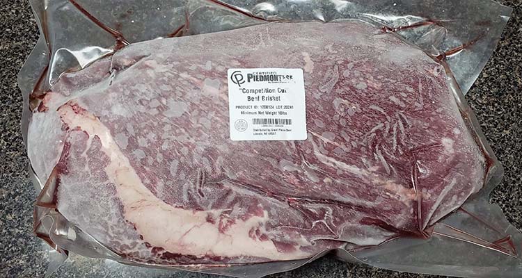 vacuum-sealed raw Certified Piedmontese beef brisket
