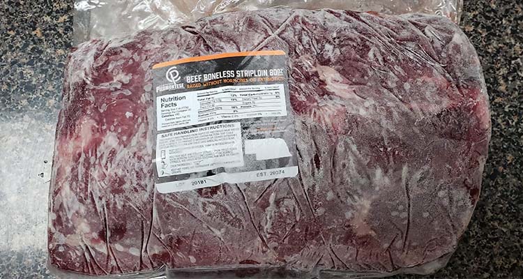 vacuum-sealed raw Certified Piedmontese beef sirloin roast
