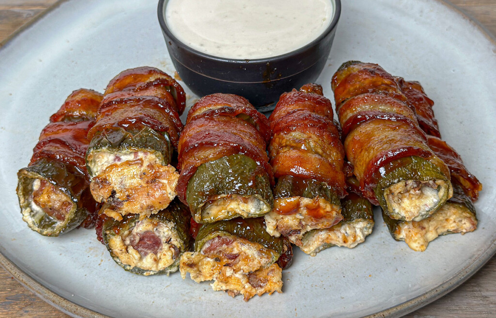 texas swinkies on a plate with dipping sauce
