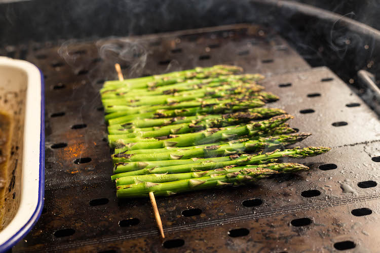asparagus on a skewer on a grill