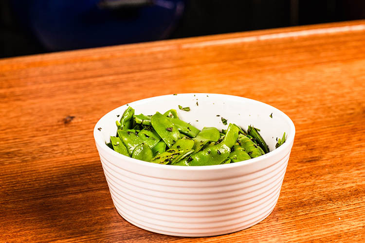minted snow peas in a bowl