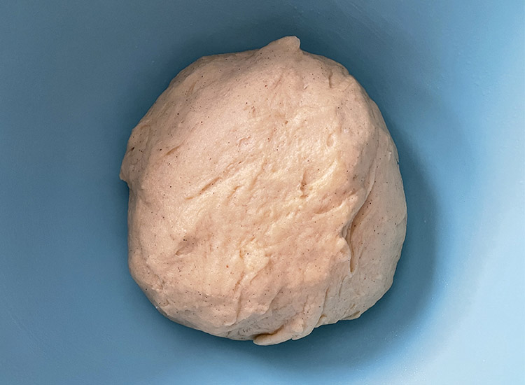 dough in a blue bowl