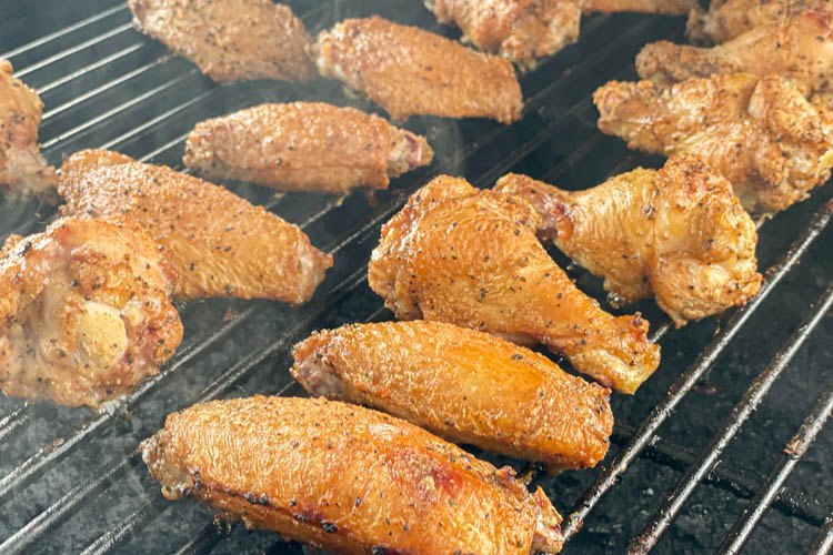 cooked chicken wings on the grill
