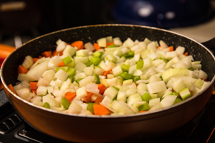 diced vegetables in a frying pan