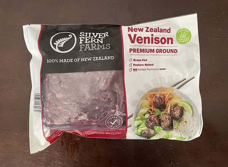 packaged ground venison from silver fern farms on a wooden table