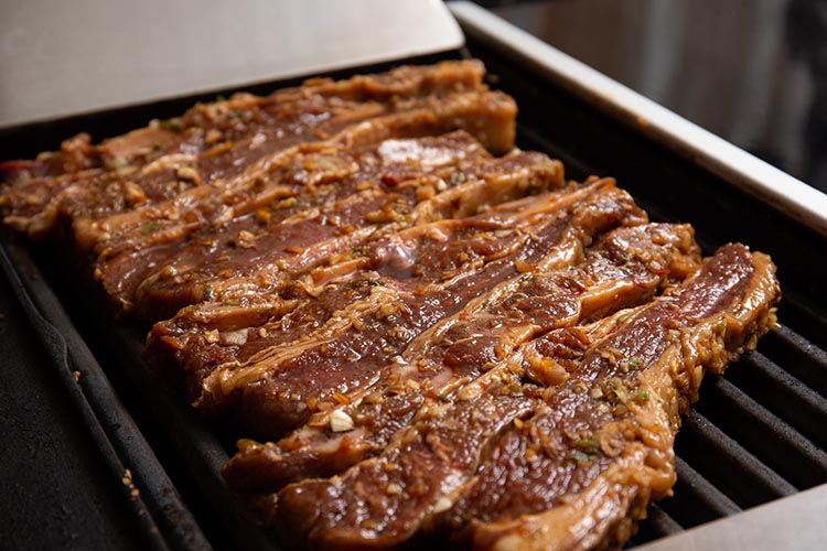 marinated korean bbq ribs on a grill