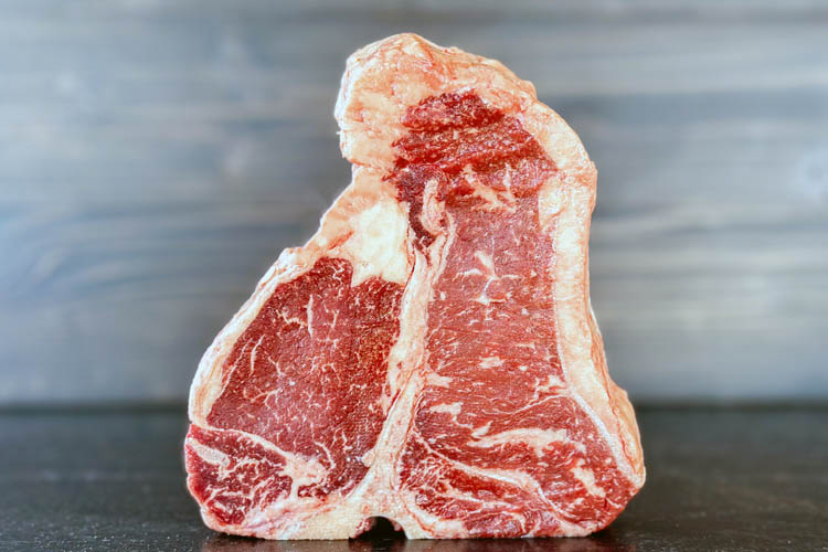 raw piece of porterhouse steak