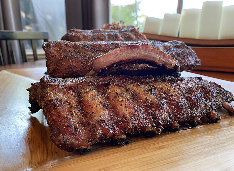 smoked pork ribs on a wooden table