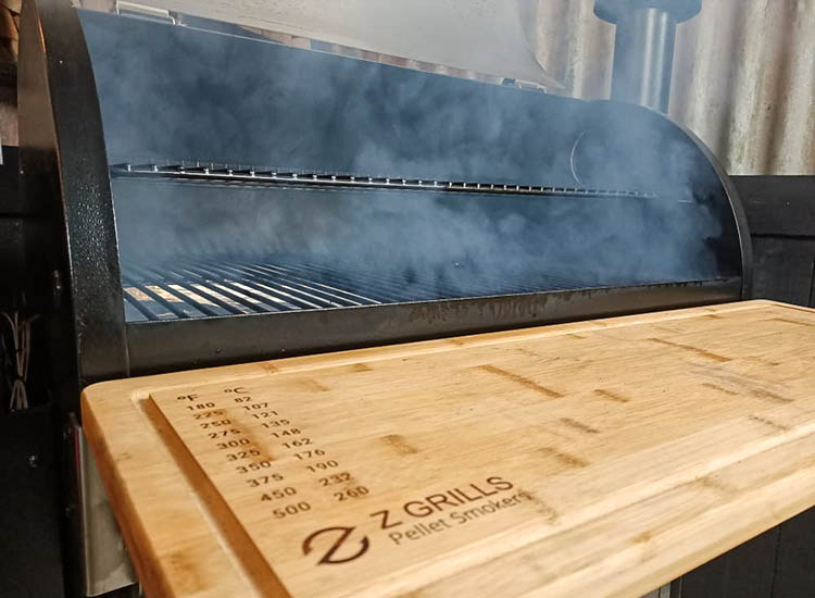 smoke coming from the Z Grills 700 pellet smoker
