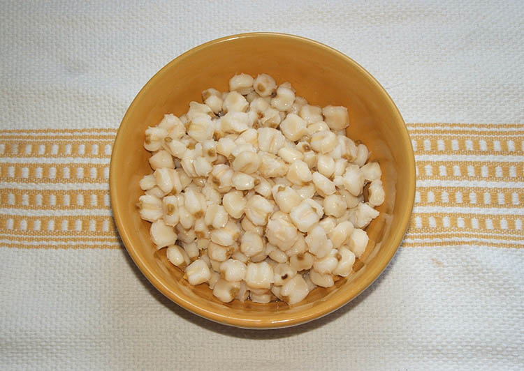 a bowl of cooked hominy