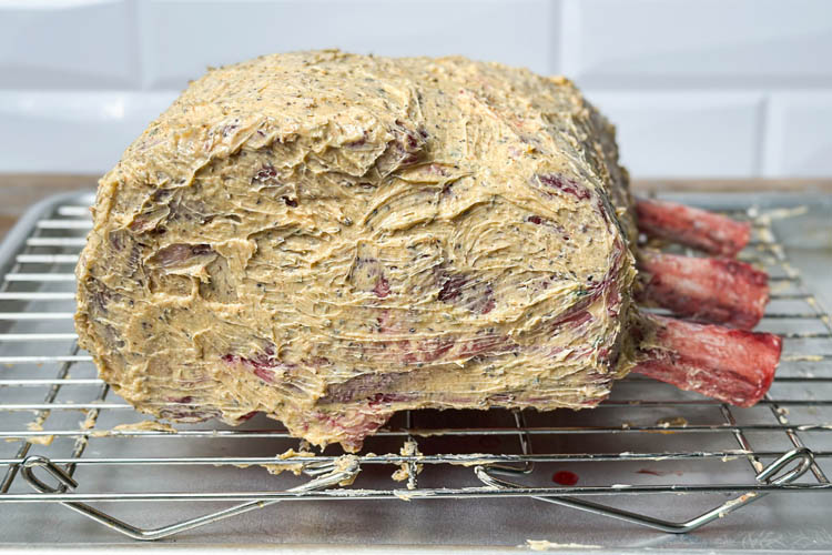buttered prime rib on a wire rack