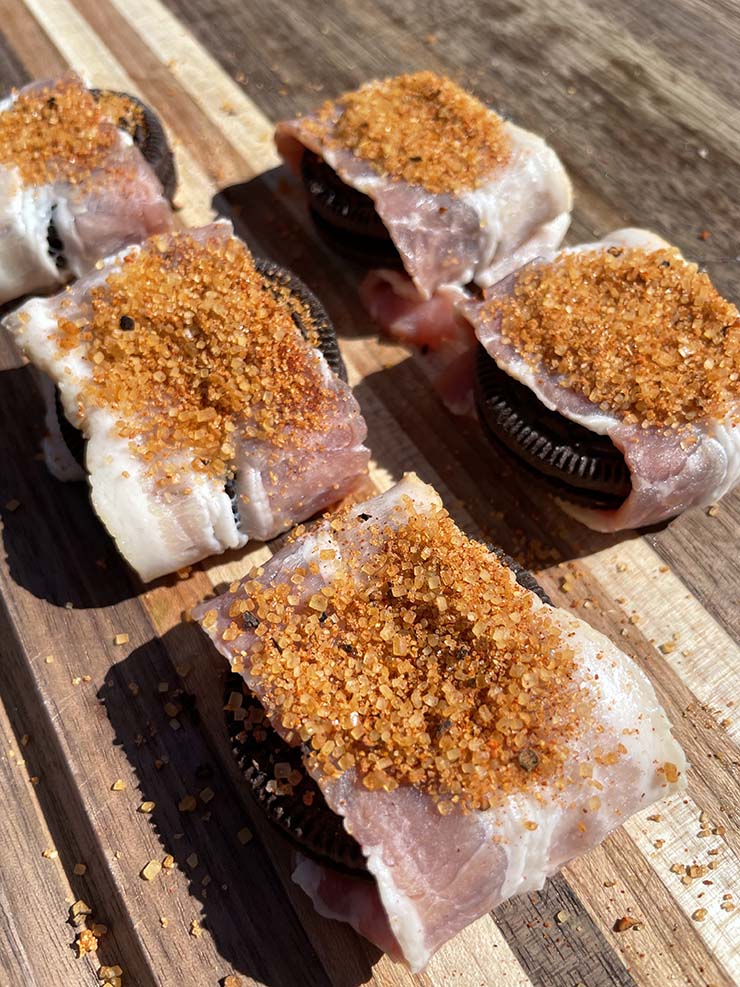 oreo cookies wrapped in bacon with bbq rub on top