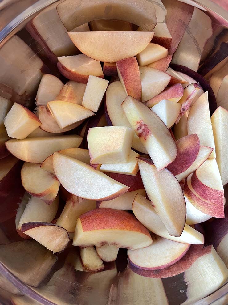 peach slices in a bowl