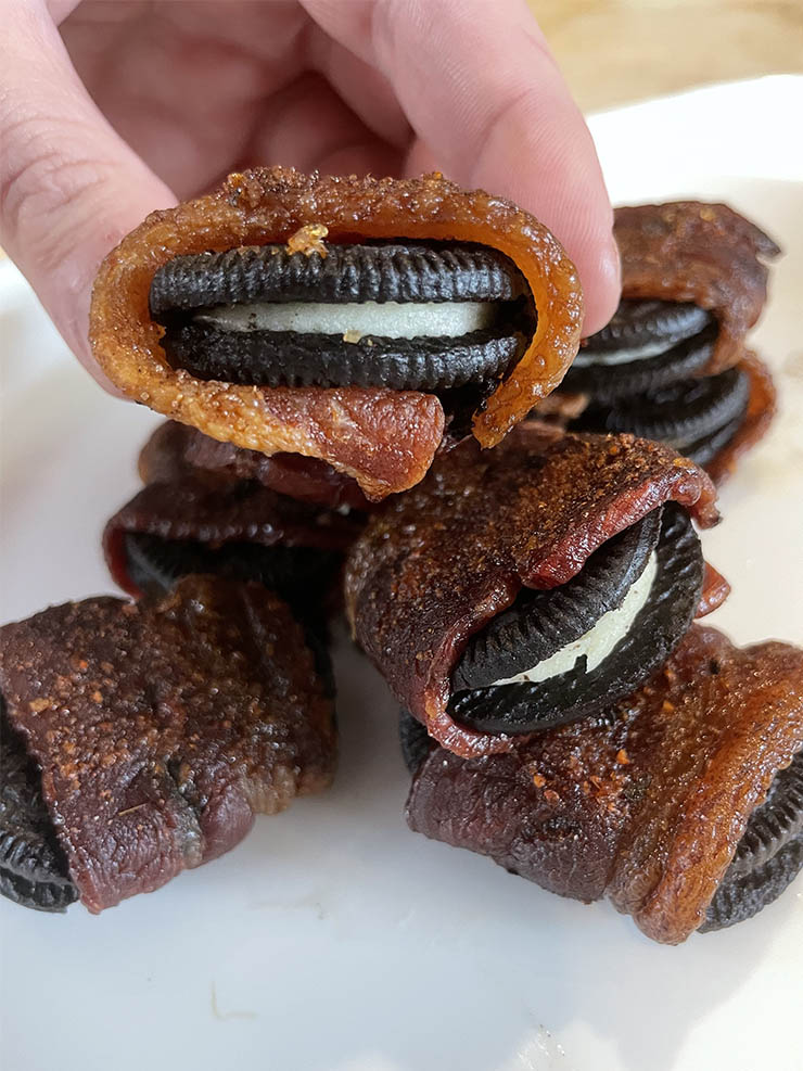 smoked bacon wrapped oreos on a plate