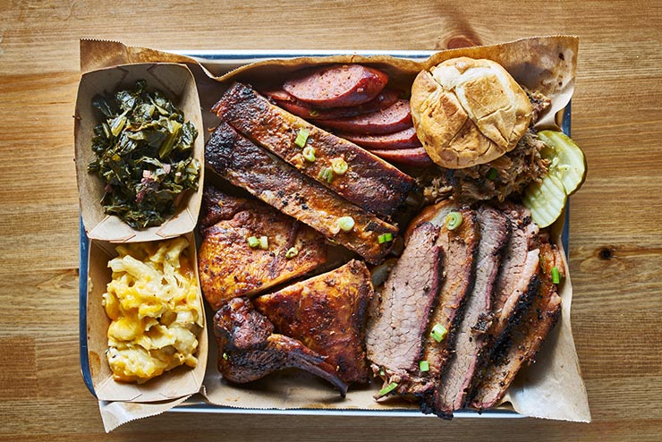 texas bbq style tray with smoked beef brisket, st louis ribs, ch