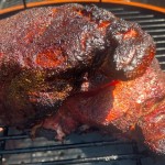 competition-style pork butt on the grill