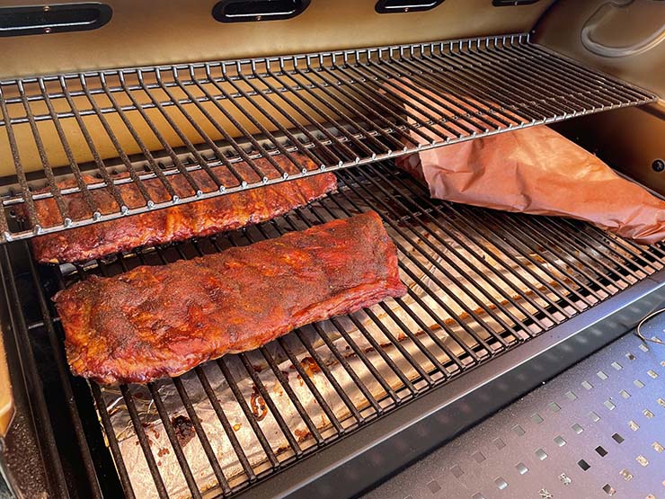 pork ribs and beef brisket smoking in the Z Grills 11002B pellet grill