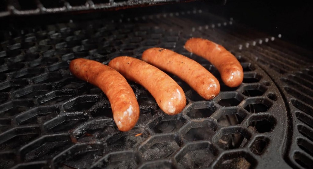 sausages smoking on the Oklahoma Joe's Rider DLX 1200 pellet grill