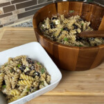cranberry walnut pasta salad in large bowl and small bowl