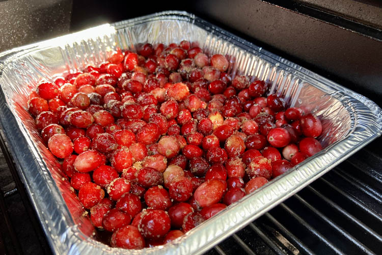 uncooked cranberries in aluminum tray