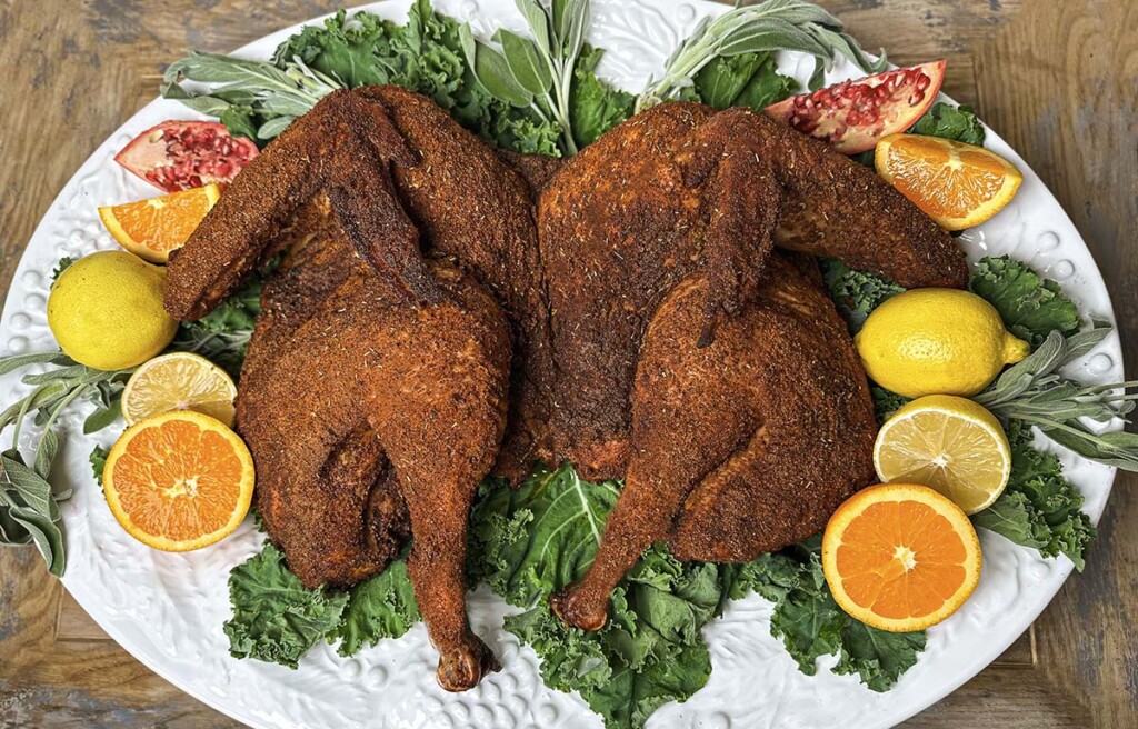 spatchcock pellet grill smoked turkey on serving platter