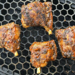 smoked pork wings on grill