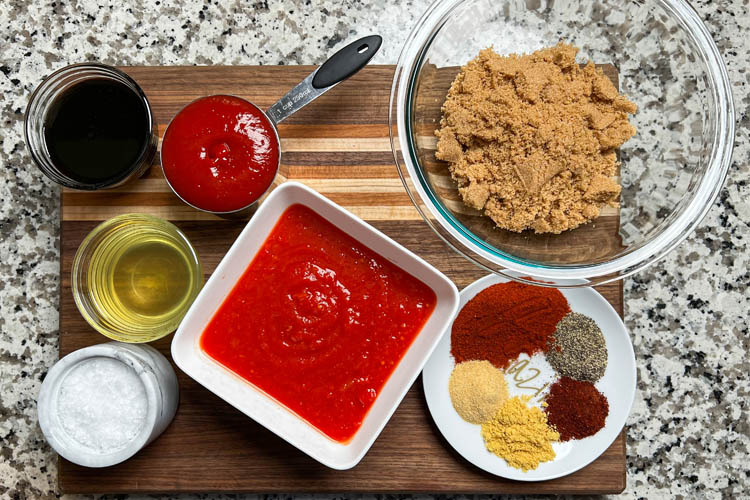 Kansas City sauce ingredients on a wooden board