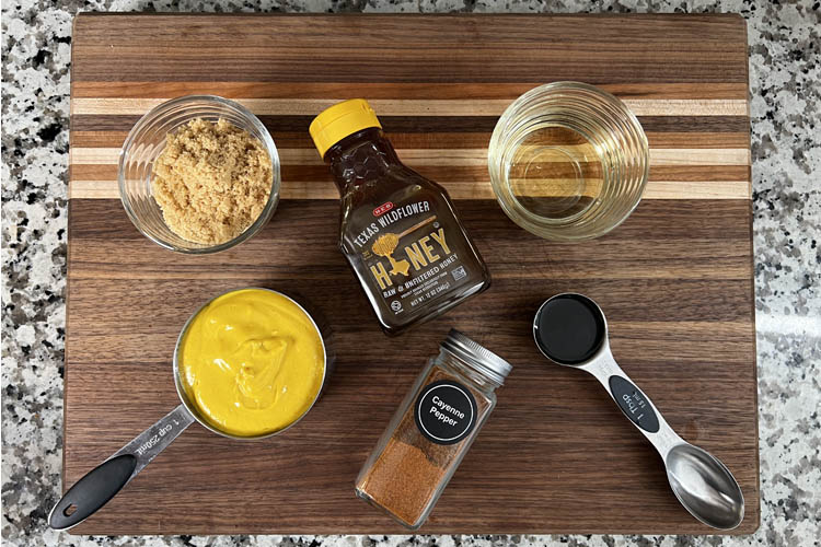 ingredients for carolina gold sauce on a wooden chopping board