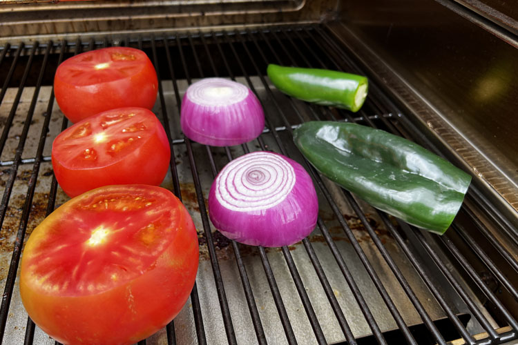 tomato, onion and peppers on the grill