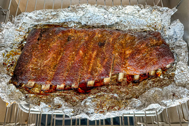 ribs unwrapped on foil