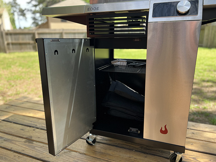 Char Broil Edge grill with an open door and storage space