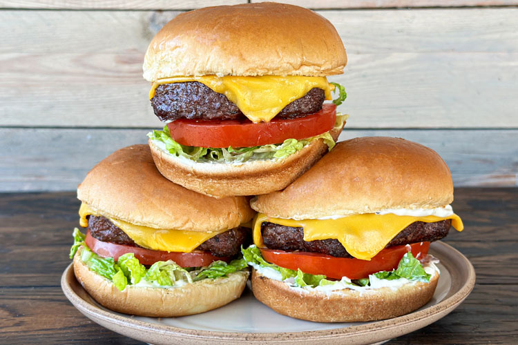 three burgers on a plate