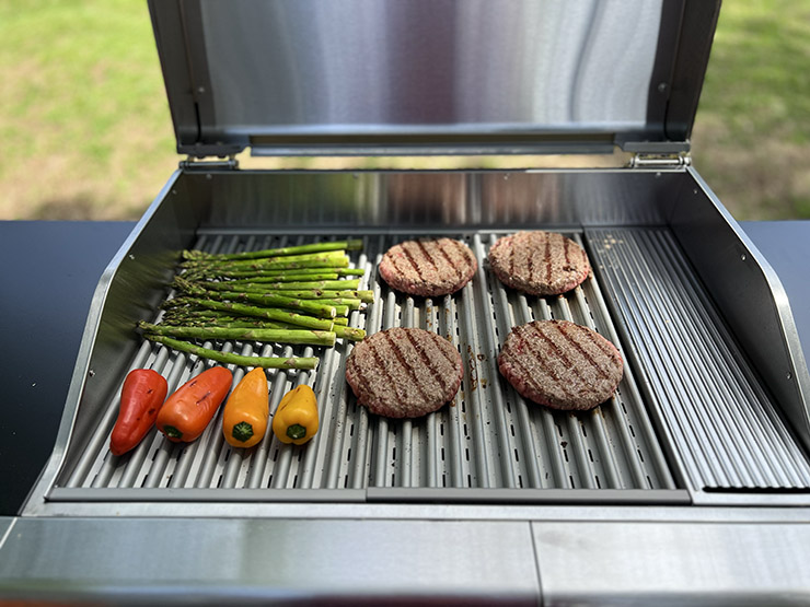 grilled burger patties and vegetables on the Char Broil Edge electric grill