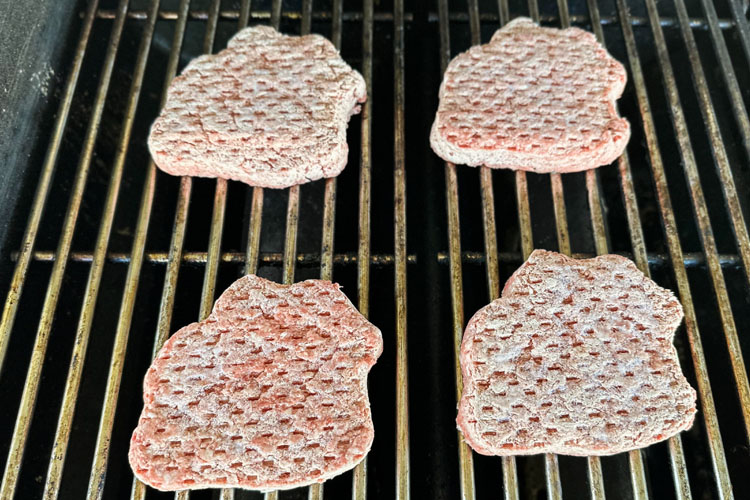 frozen burger on the grill