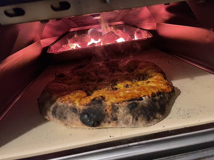 pizza inside the Ooni Karu 16 pizza oven