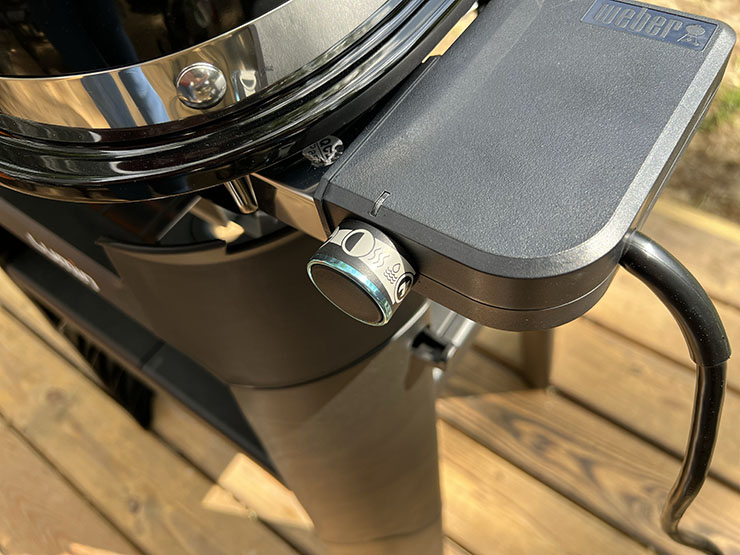 a close up view of the control knob on the Weber Lumin grill