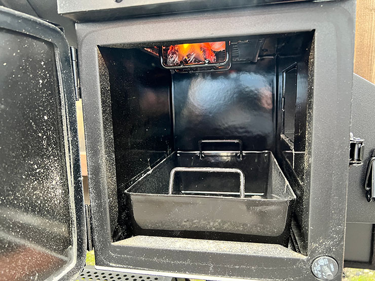 charcoal burning in the hopper of the Char-Griller Gravity 980