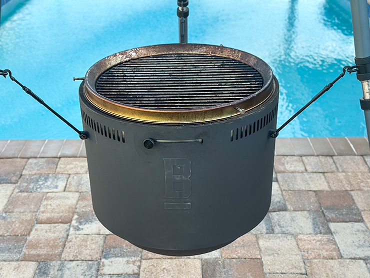 a close up view of the Burch Barrel Grill with an open lid