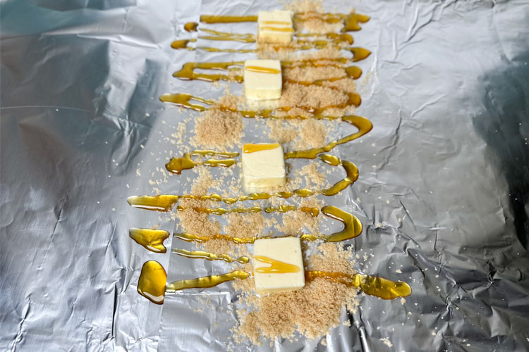 foil with butter, brown sugar and honey on it
