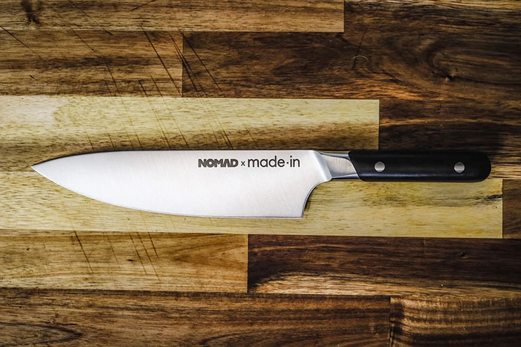 Nomad Chef Knife on a wooden board