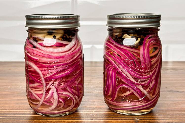 two jars of pickled red onions