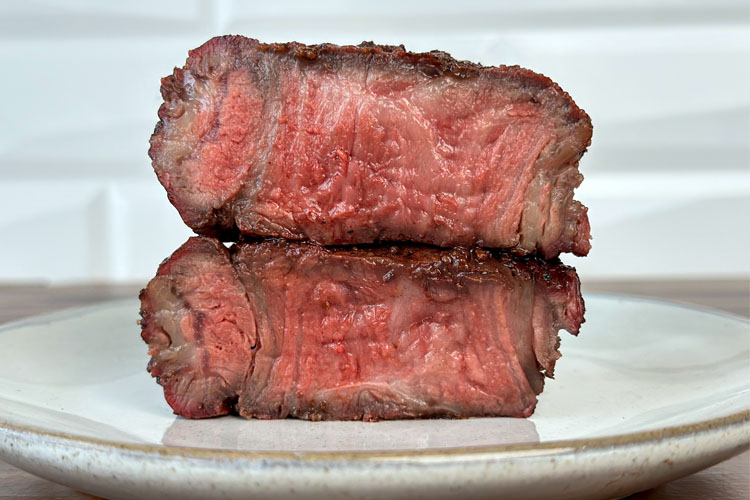 a ribeye cap cut in half and stacked on top of each other