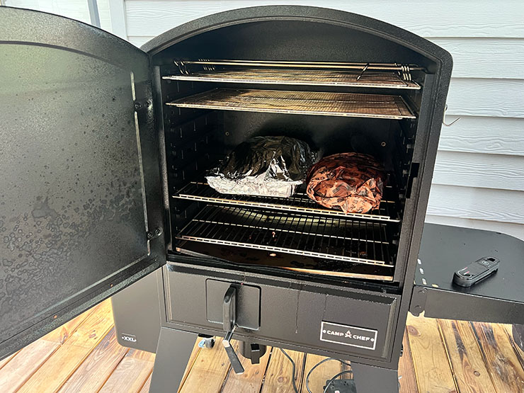 wrapped brisket and pork butt smoking on the Camp Chef XXL Pro pellet grill