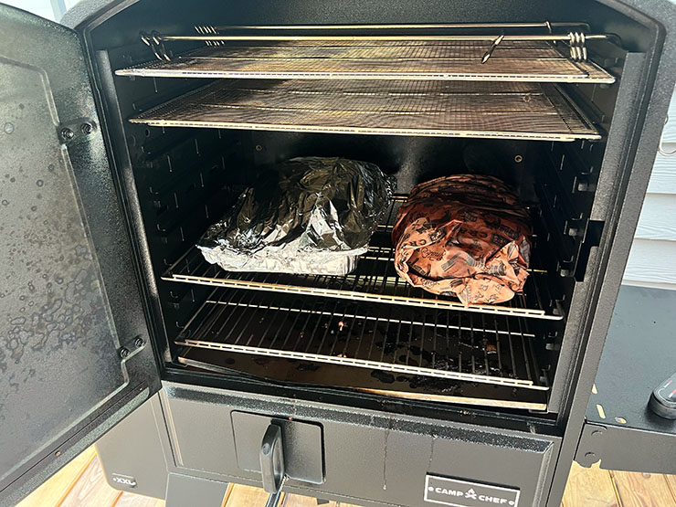 meat smoking inside the Camp Chef XXL Pro pellet grill